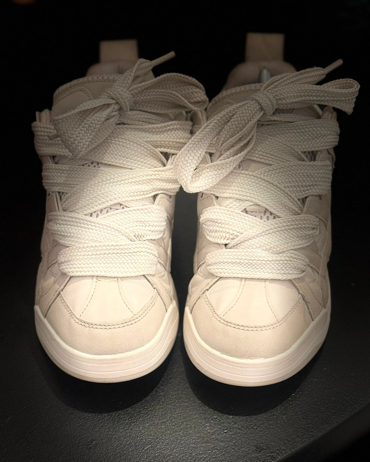 Cream leather high-tops after cleaning