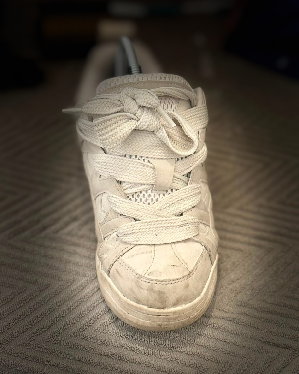 Cream leather high-tops before cleaning